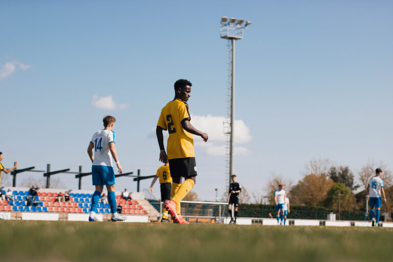 MICFootball players on soccer field