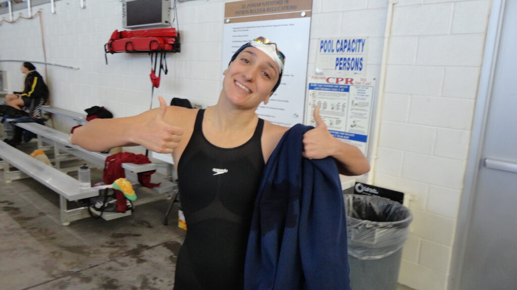 Helena Robla at a college swimming competition