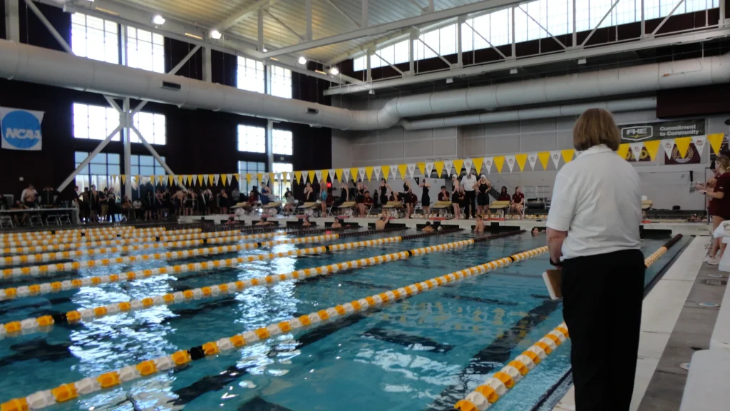 Pool at a college swimming meet