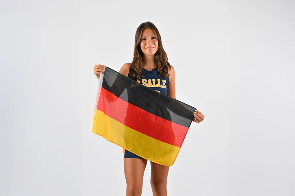 Matilda Diedrichsen holding flag
