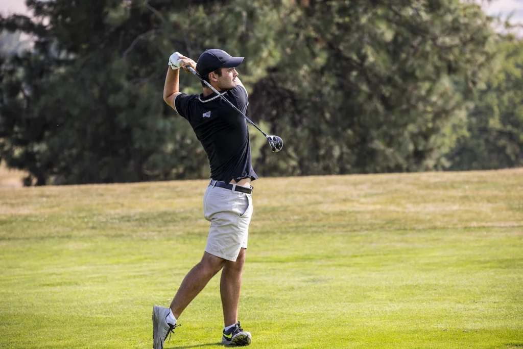 College golf player Enrique Marin competing for her university